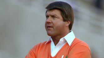 Miami football coaches on sideline during championship game at Sun Devil Stadium